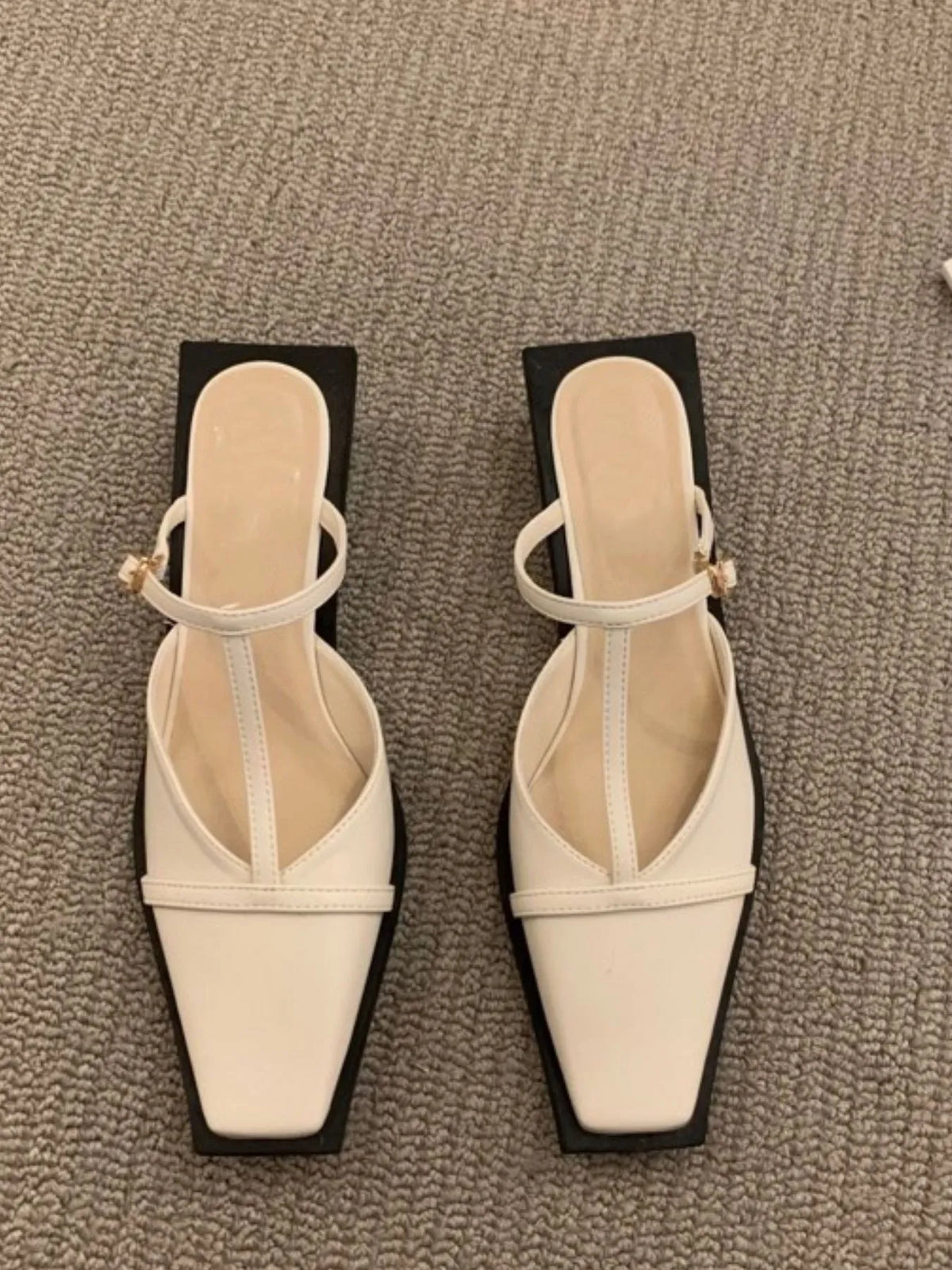 Women's square toe T-strap sandals by Trendsi featuring a stylish design and comfortable fit, shown in a versatile neutral color.