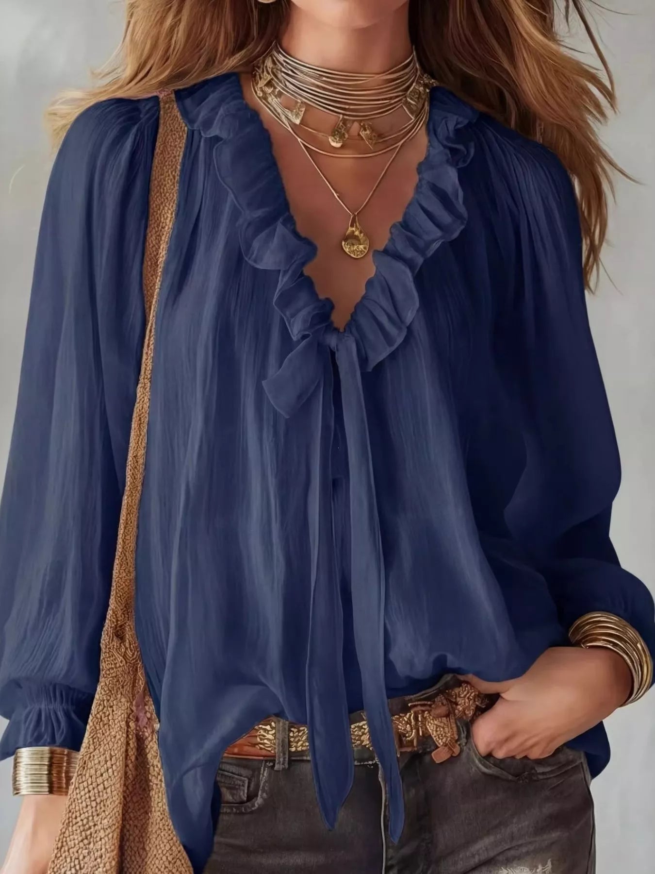 Ruffle long sleeve blouse by Shopimist featuring soft fabric and feminine ruffle details on the sleeves.