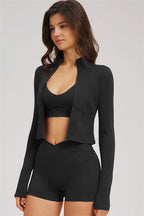 Fitglutes activewear sports bra, zip jacket, and shorts 3-piece set for workout and gym activities.