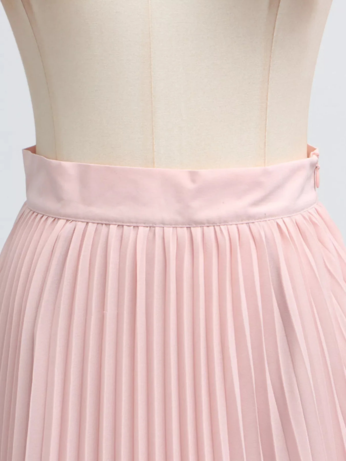 Plush Fashion Hub two-piece set featuring a frill lapel collar top and a pleated skirt, styled together for a chic look.