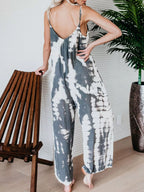 Full size Shopimist tie-dye wide-leg jumpsuit featuring vibrant colors and a relaxed fit, perfect for casual wear and comfort.