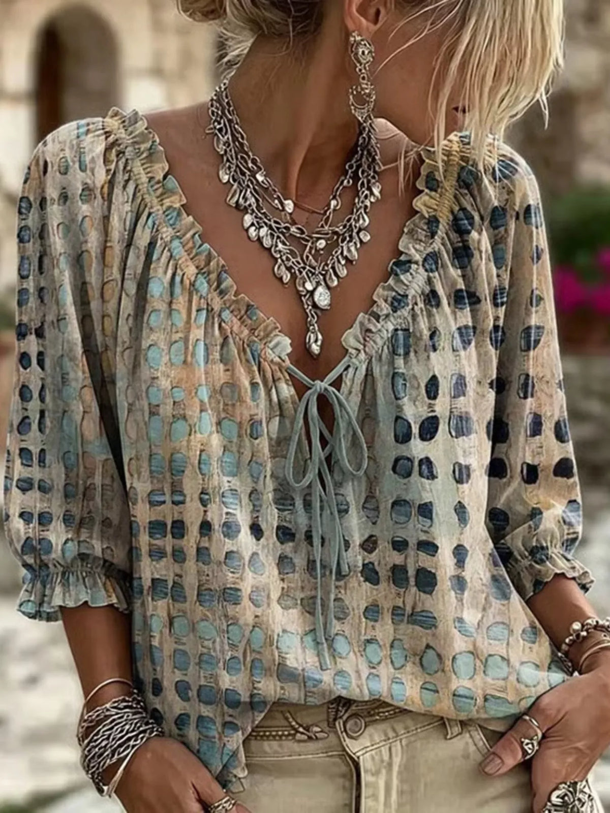 Plus size tie neck blouse with 3/4 sleeves from Trendsi, featuring a full-size fit and stylish design.