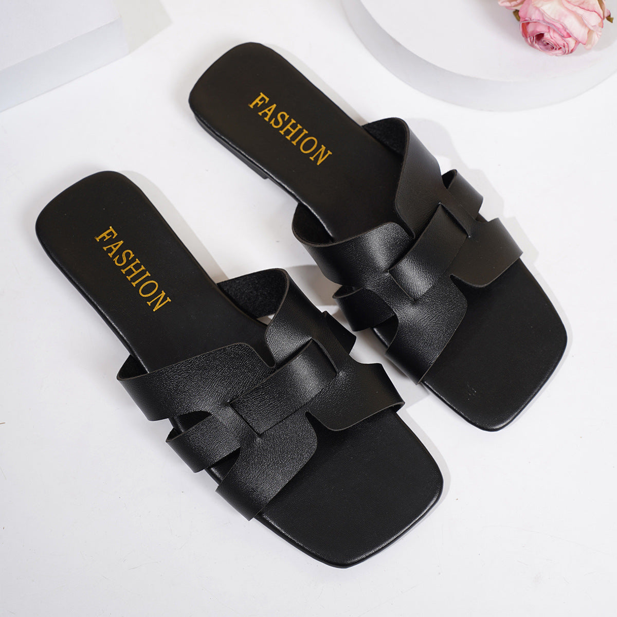 Plush Fashion Hub woven strap slide sandals with a casual open-toe design and comfortable flat sole.