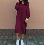 Women's casual long-sleeved hooded sweater with front pocket and drawstring, made by Plush Fashion Hub.