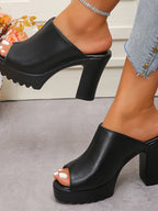 Women's chunky platform block heel sandals in faux leather with open-toe design, stylish trendy shoe by Trendsi.