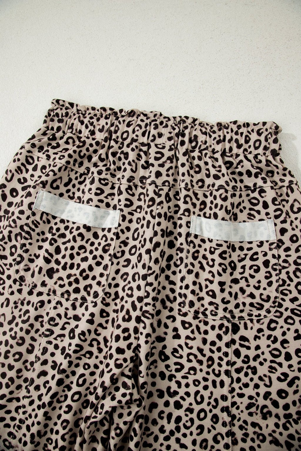 Aitana Leg Terry Knit Pants by Threaded Pear, stylish casual pants made of soft terry knit fabric, displayed on a model.
