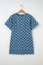 Threaded Pear Jessie Hem Checkered Mini Dress hanging on a hanger, showcasing its stylish checkered pattern and mini length.