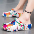 Colorful men's paint splash sandals by Trendsi featuring vibrant, artistic design and comfortable footwear style.