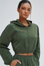 Svelte UV protection crop hoodie by Fitglutes Activewear, showing a lightweight, fitted hoodie with UV protection fabric and sporty design.