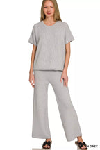 Zenana viscose round neck top and pants set in soft fabric, shown in a stylish, comfortable outfit on a neutral background.
