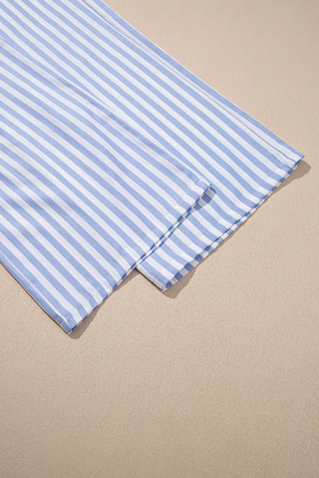 Light beige Brooke Waist Loose Summer Pants by Threaded Pear, featuring a relaxed fit and wide-leg design.