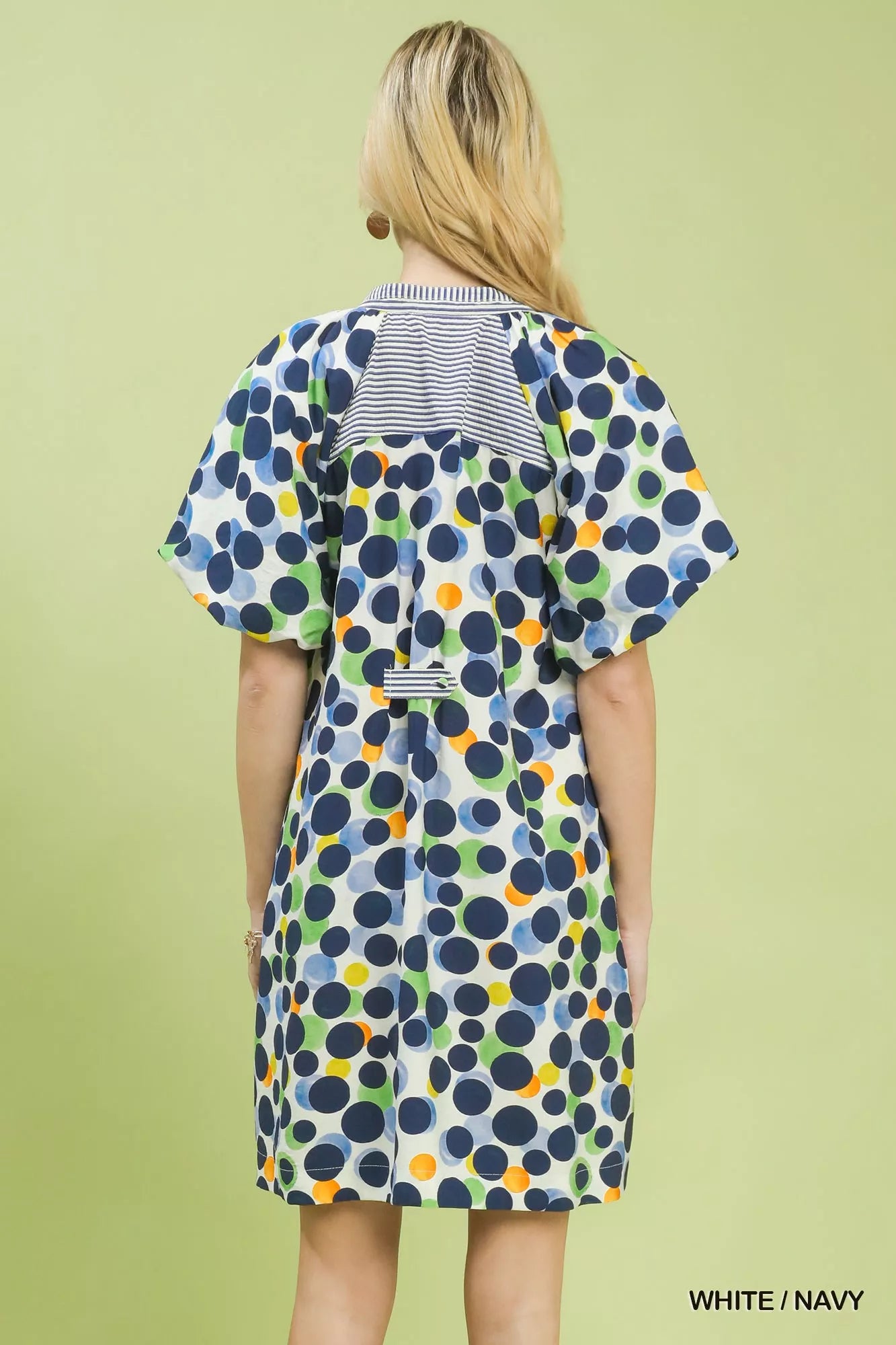 Umgee polka dot print tunic dress with long sleeves and relaxed fit, stylish casual wear for women.