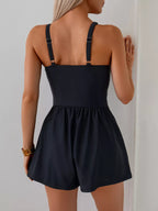 Women's V-neck spaghetti strap one-piece swimsuit by Trendsi, featuring a stretchy, stylish beachwear design.