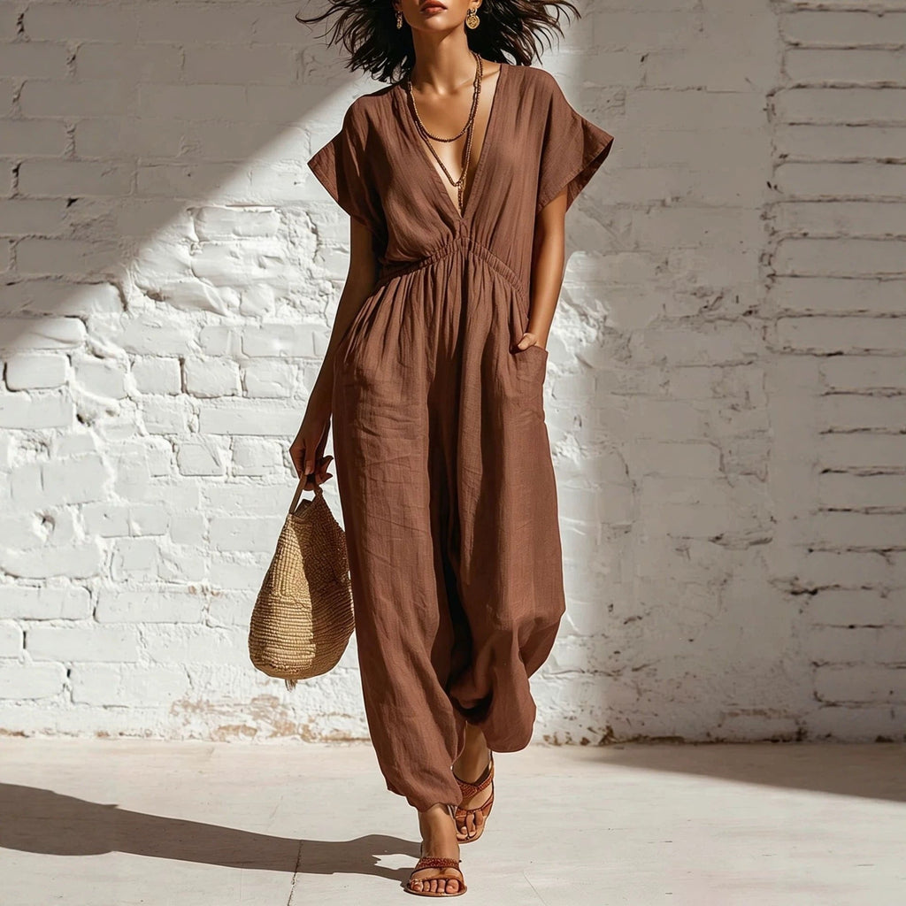 Women's deep V-neck three-quarter sleeve high waist wide leg pants by FitiqueFit, shown in a stylish pose.