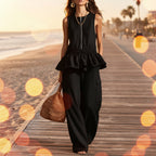 Women's sleeveless pleated vest and wide-leg pants set by FitiqueFit, stylish streetwear two-piece outfit with modern design.