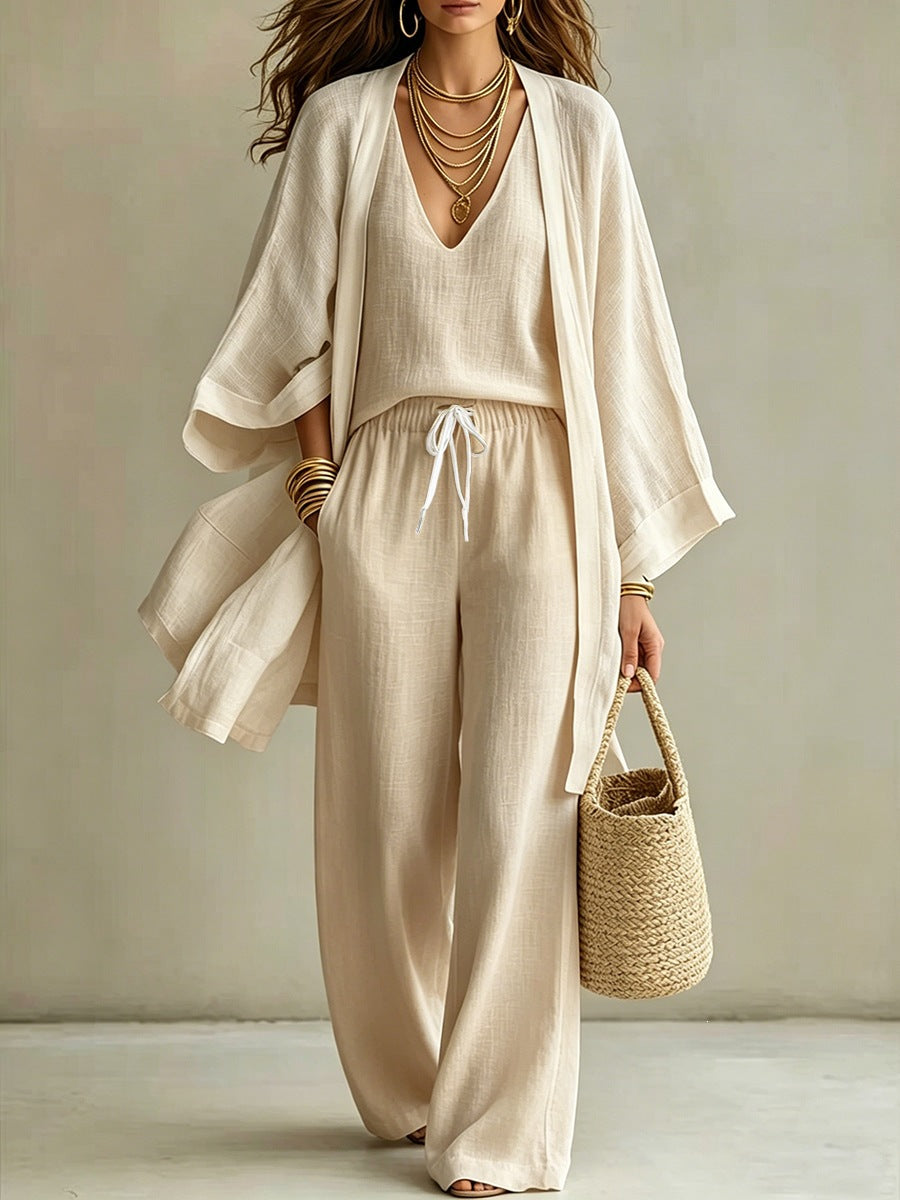 Women's 3-piece cardigan, sleeveless vest, and wide-leg pants set by Plush Fashion Hub, featuring a stylish matching ensemble.
