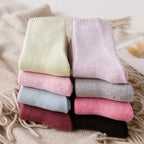 Thick cotton women's thermal socks for autumn and winter, cozy and warm, in natural colors, suitable for cold weather.