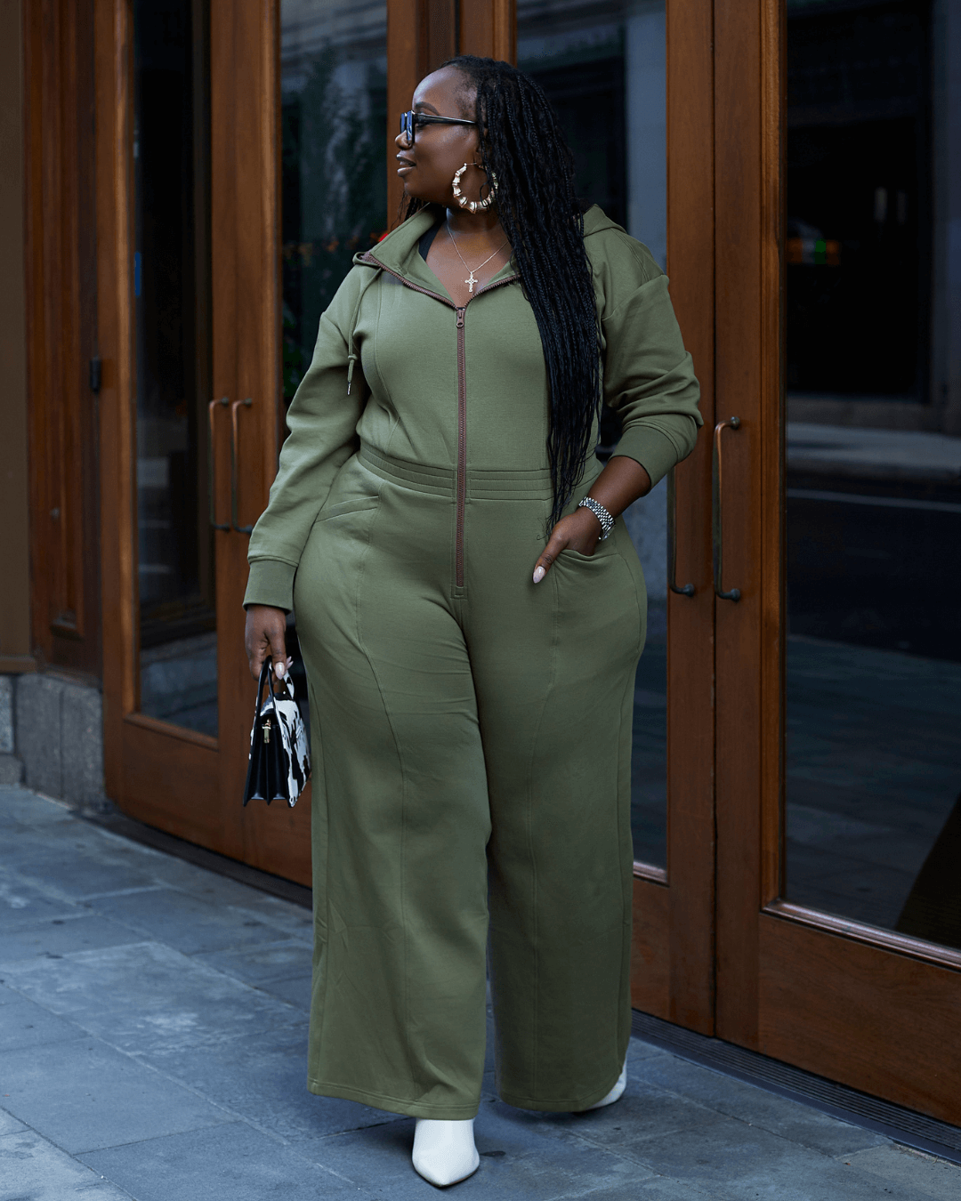 Green satin-lined jumpsuit by Plush Fashion Hub featuring long sleeves and a fitted silhouette.