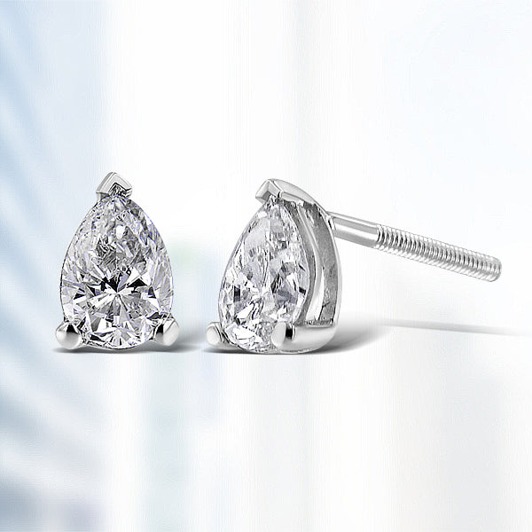 14K white gold pear-shaped solitaire lab-grown diamond stud earrings with F-G color and VS2-SI1 clarity, showcasing elegant jewelry.
