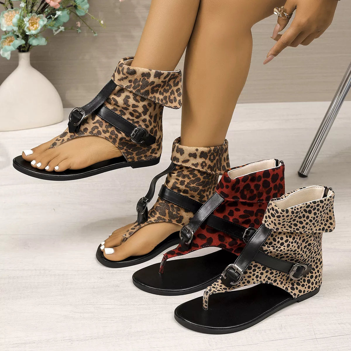 Leopard print toe post sandals from Plush Fashion Hub featuring a stylish animal print and comfortable flat sole.