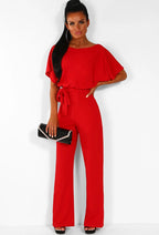 Short-sleeve women's body suit by Plush Fashion Hub, form-fitting jumpsuit with straight-leg design and adjustable strap details.