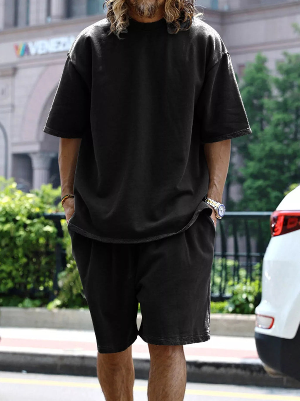 Men's relaxed fit T-shirt and shorts set by Trendsi, plus size casual tops and shorts for comfortable everyday wear.