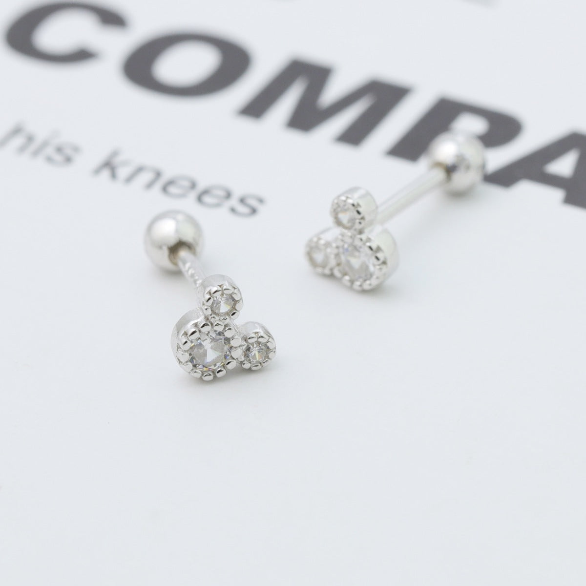 Shopimist Mickey Mouse stud earrings featuring small, detailed Mickey Mouse face designs in shiny metal for a cute, playful look.