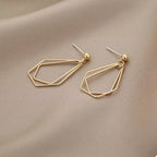 Gold-plated alloy geometric wire drop earrings with modern design, featuring sleek lines and minimalist style.