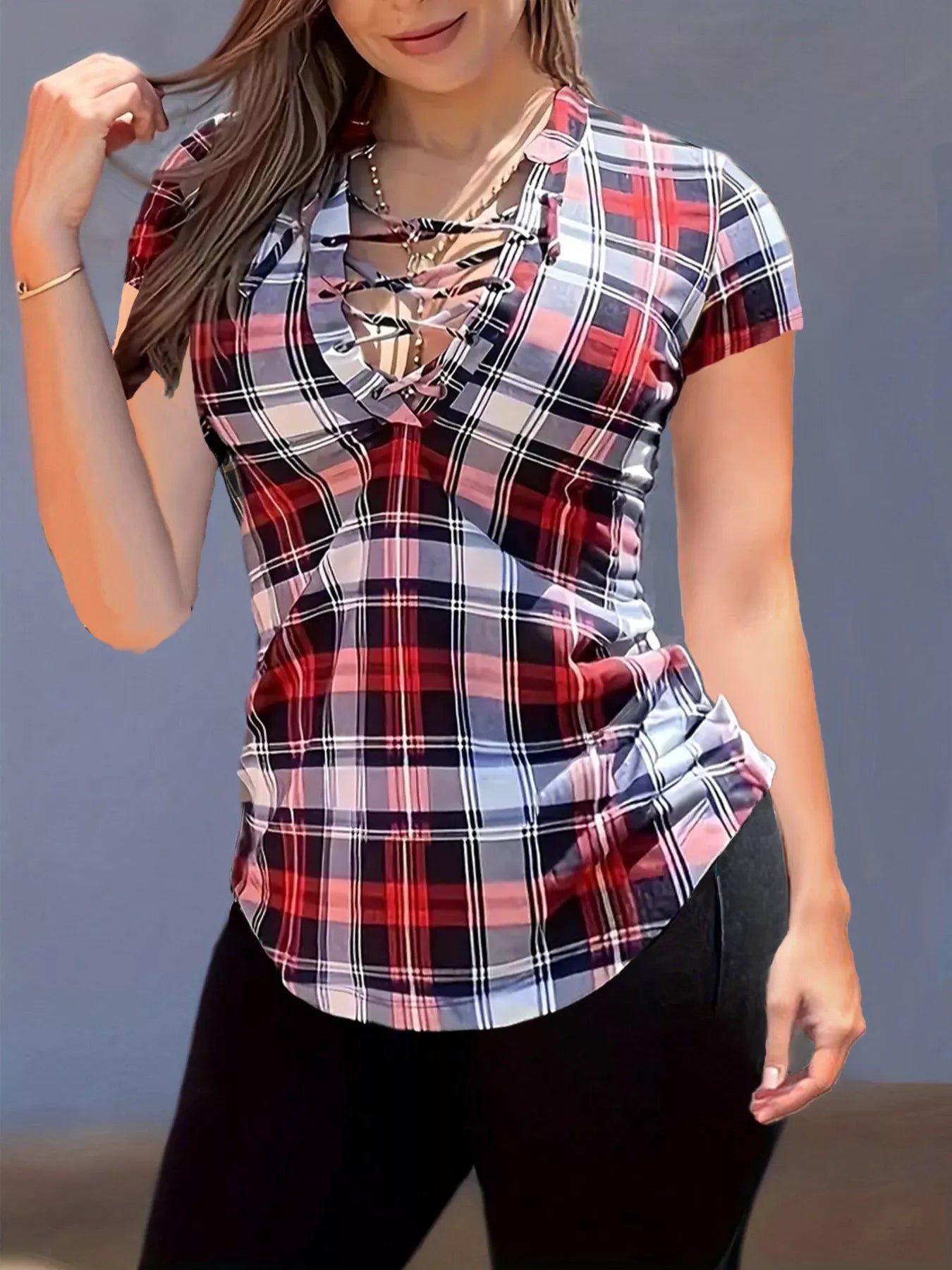Plaid lace-up short sleeve blouse from Plush Fashion Hub, featuring a stylish design and relaxed fit suitable for casual wear.