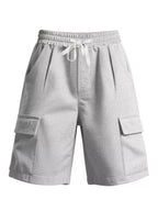 Men's plus size drawstring pocketed shorts from Trendsi, featured in the image with a comfortable fit and casual style.