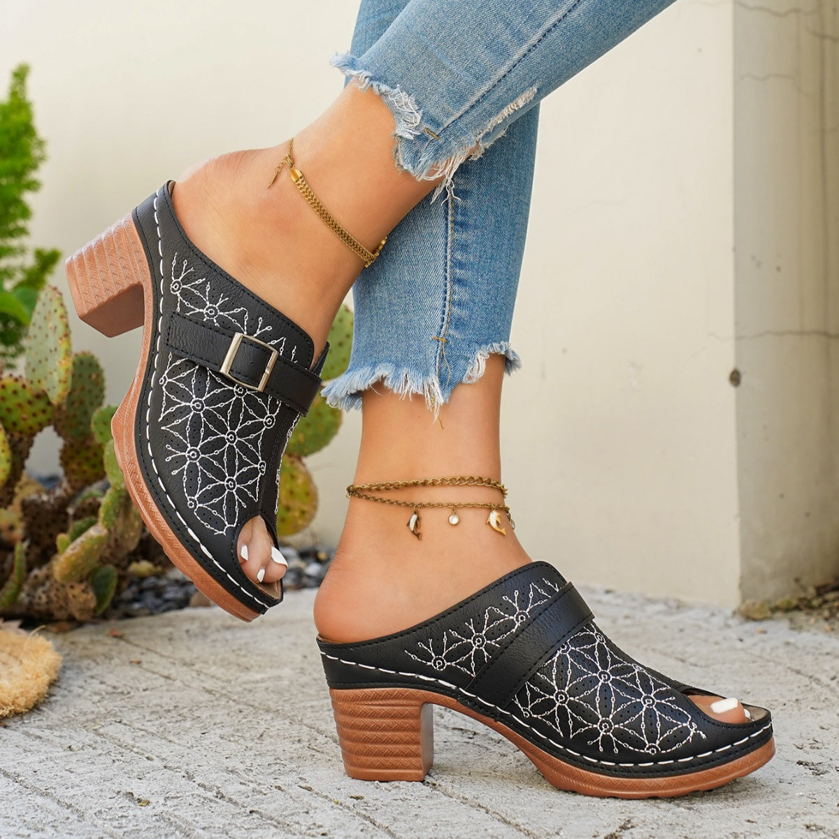 Women's chic buckle detail block heel sandals in premium faux leather, featuring stylish straps and a comfortable heel.