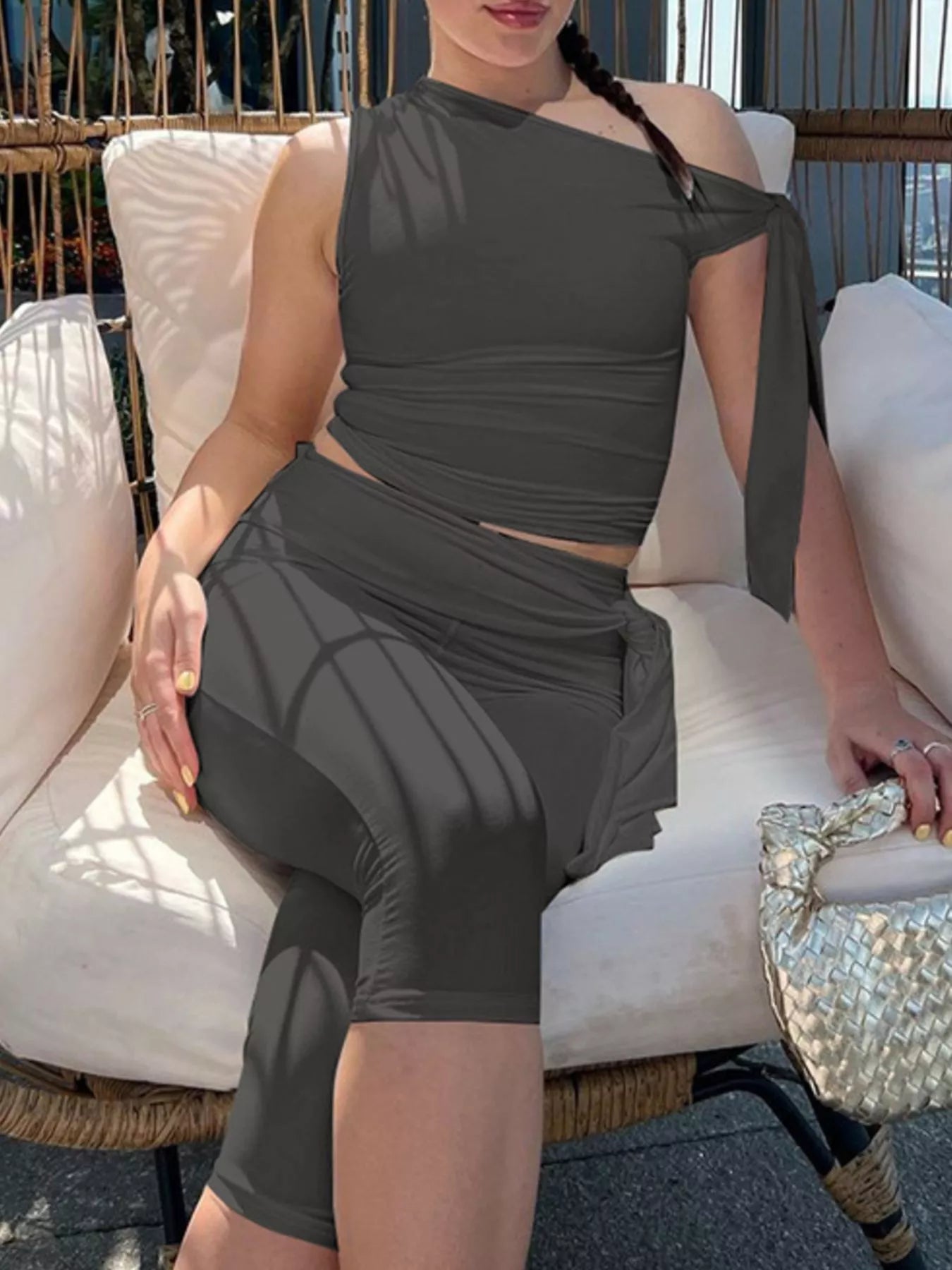 Plush Fashion Hub asymmetrical one-shoulder top with matching capris set, featuring stylish design and comfortable fit.