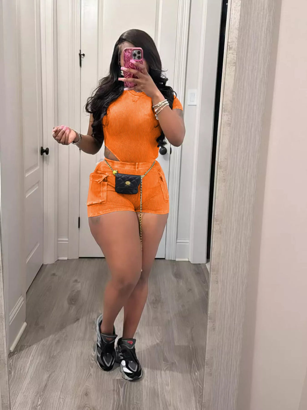 Ribbed knit bodysuit and shorts set by Shopimist, featuring a fitted design and casual style, shown on a model.