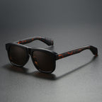 Unisex acetate-style polarized fashion sunglasses with luxury look, featuring dark tinted lenses and stylish frame design.