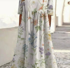 Plus-size patchwork maxi dress by FitiqueFit featuring a relaxed fit, casual style, with colorful patchwork patterns and flowing fabric.
