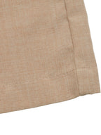 Elegant women's jumpsuit with halter neck and wide-leg design, featuring a chic, flowing silhouette for evening wear.