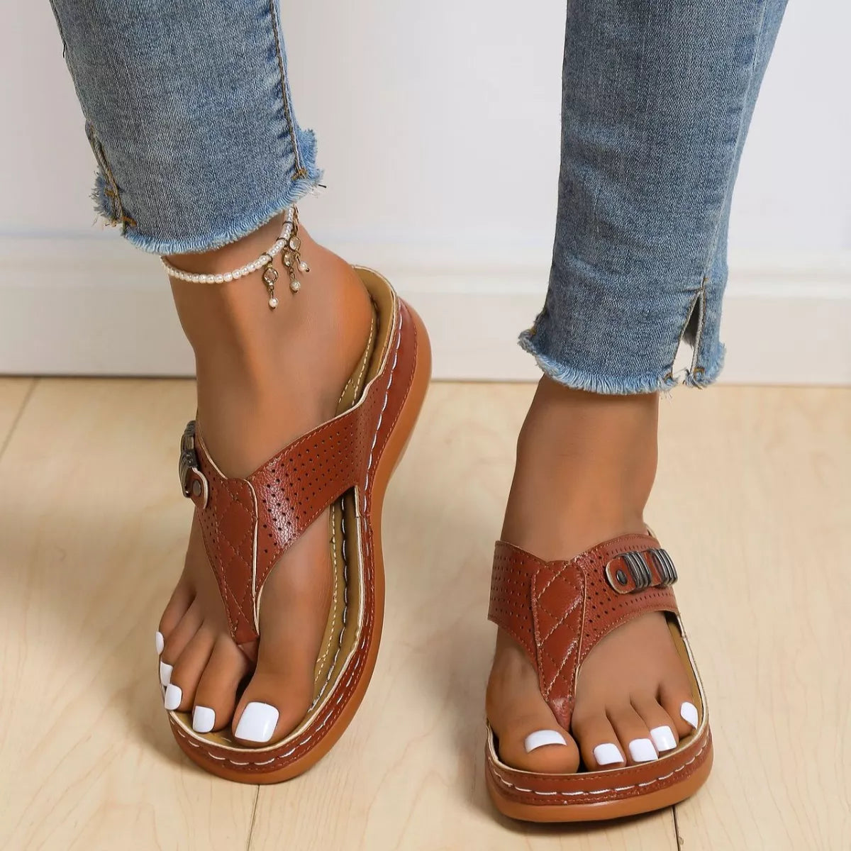 Women's comfortable toe post wedge sandals by Trendsi, stylish summer footwear with cushioned footbed and neutral color.