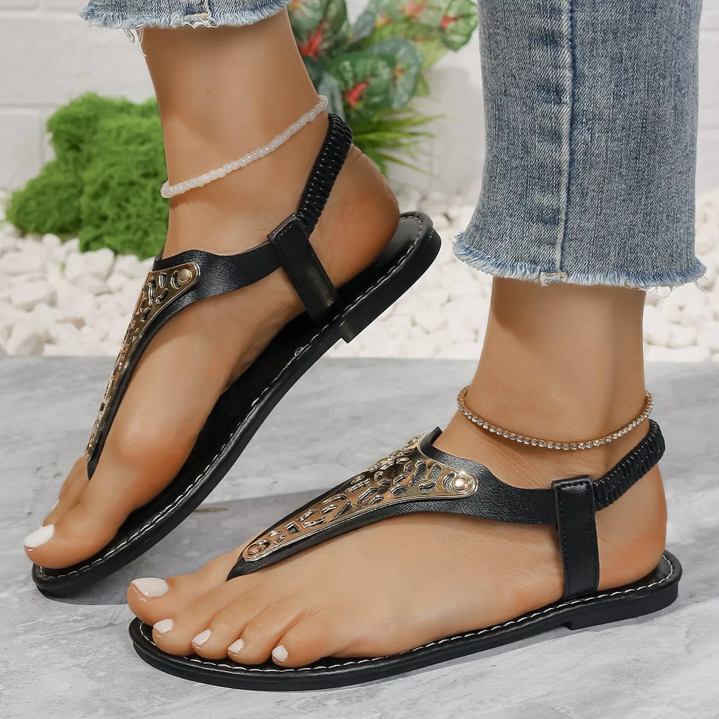 Shopimist toe post flats sandals with minimalist design, featuring comfortable straps and flat soles for casual summer wear.