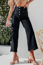 High-waisted button-fly wide-leg jeans from Trendsi, featuring classic denim with a relaxed fit and stylish design.