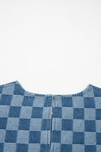 Threaded Pear Jessie Hem checkered mini dress hanging on a hanger, showcasing its stylish pattern and design details.