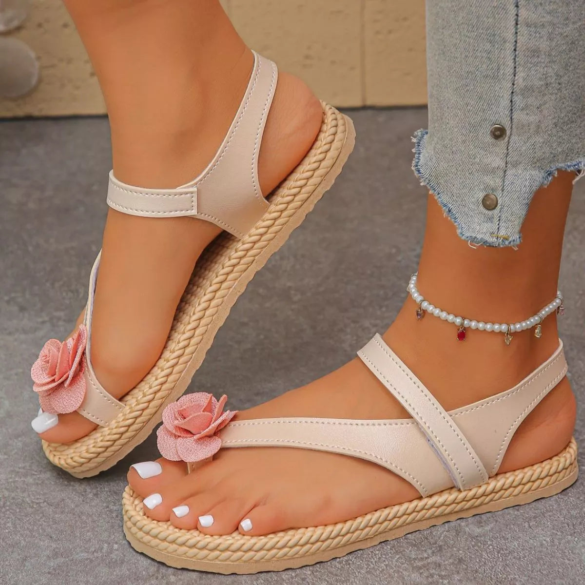 Plush Fashion Hub flower toe loop sandals featuring floral embellishments and open-toe design on a neutral background.