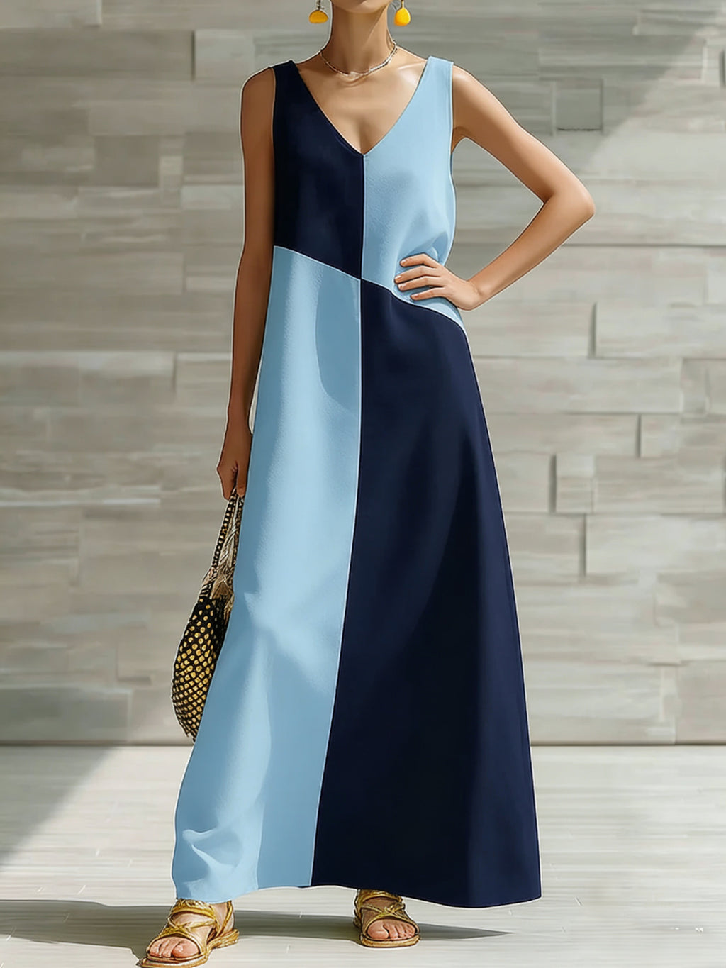 Women's chic color block sleeveless maxi dress by Trendsi, lightweight summer dress with vibrant color blocking and flowing design.