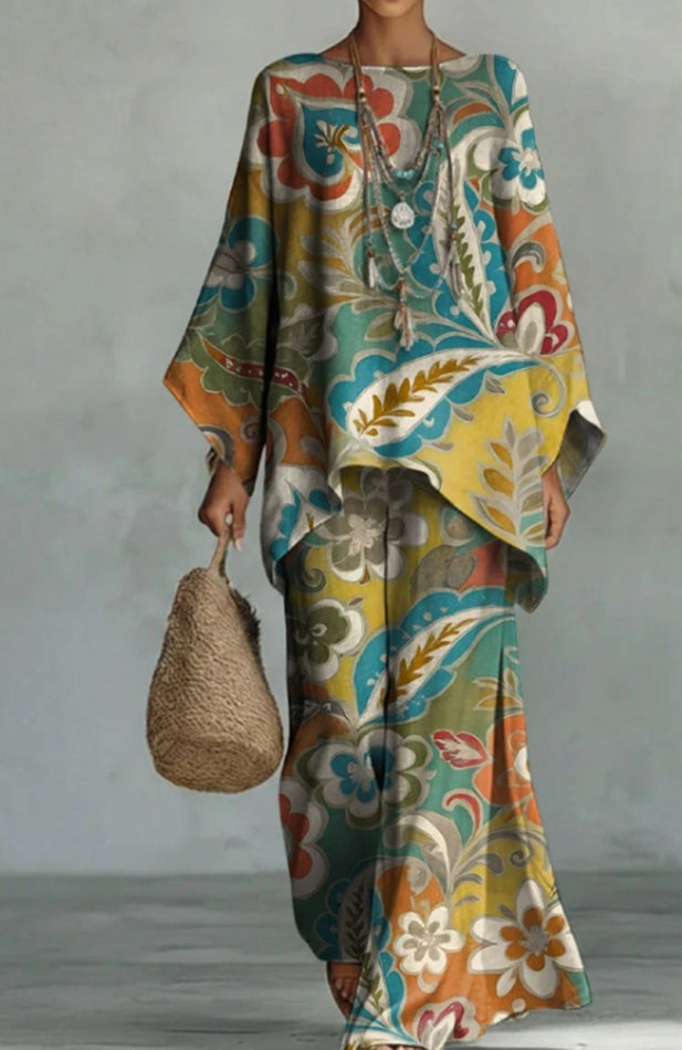 Women's colorful print casual dress by FitiqueFit, featuring vibrant patterns and a relaxed fit for everyday wear.