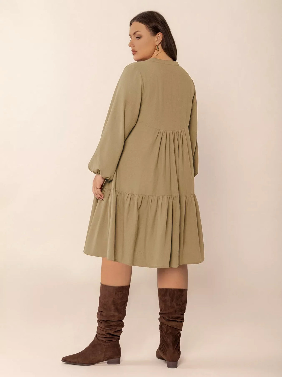 Plus size tie neck balloon sleeve dress by Plush Fashion Hub, featuring a flattering fit and stylish design, shown in the image.