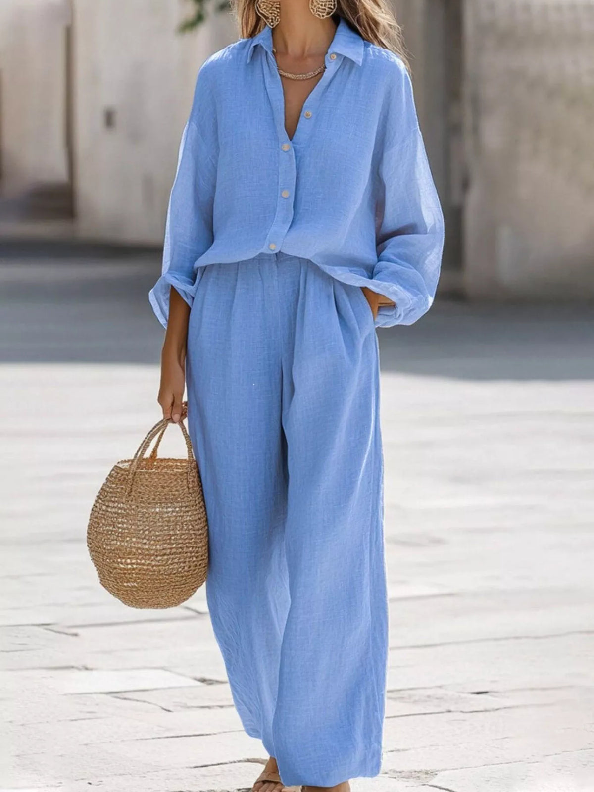 Plus size loose fit shirt and wide leg pants matching set by Trendsi, styled with relaxed fit, casual wear, and comfortable fabric.