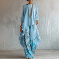 FitiqueFit solid color sleeveless top and wide-leg pants two-piece set, shown in a stylish, coordinated outfit.