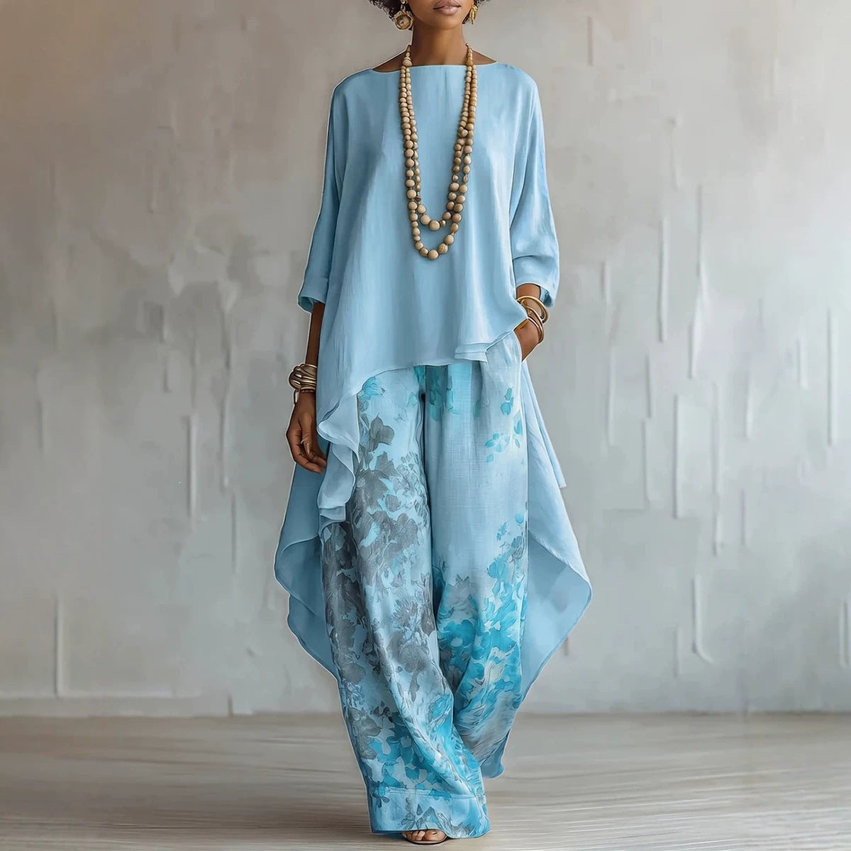FitiqueFit solid color sleeveless top and wide-leg pants two-piece set, shown in a stylish, coordinated outfit.