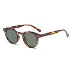 Retro round UV400 sunglasses with tinted European-style frames, featuring a stylish and classic eyewear design from Plush Fashion Hub.