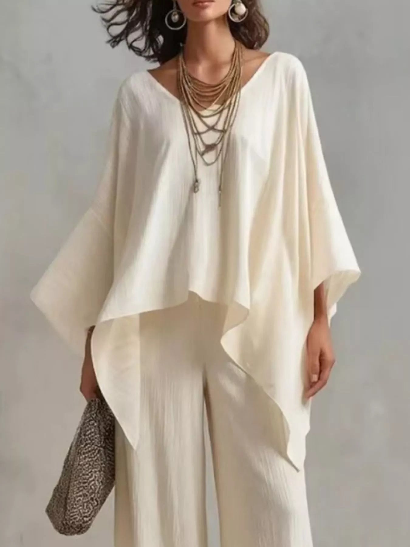 Plus size V-neck top and pants loungewear set from Plush Fashion Hub, comfortable full-size lounge outfit in soft fabric.