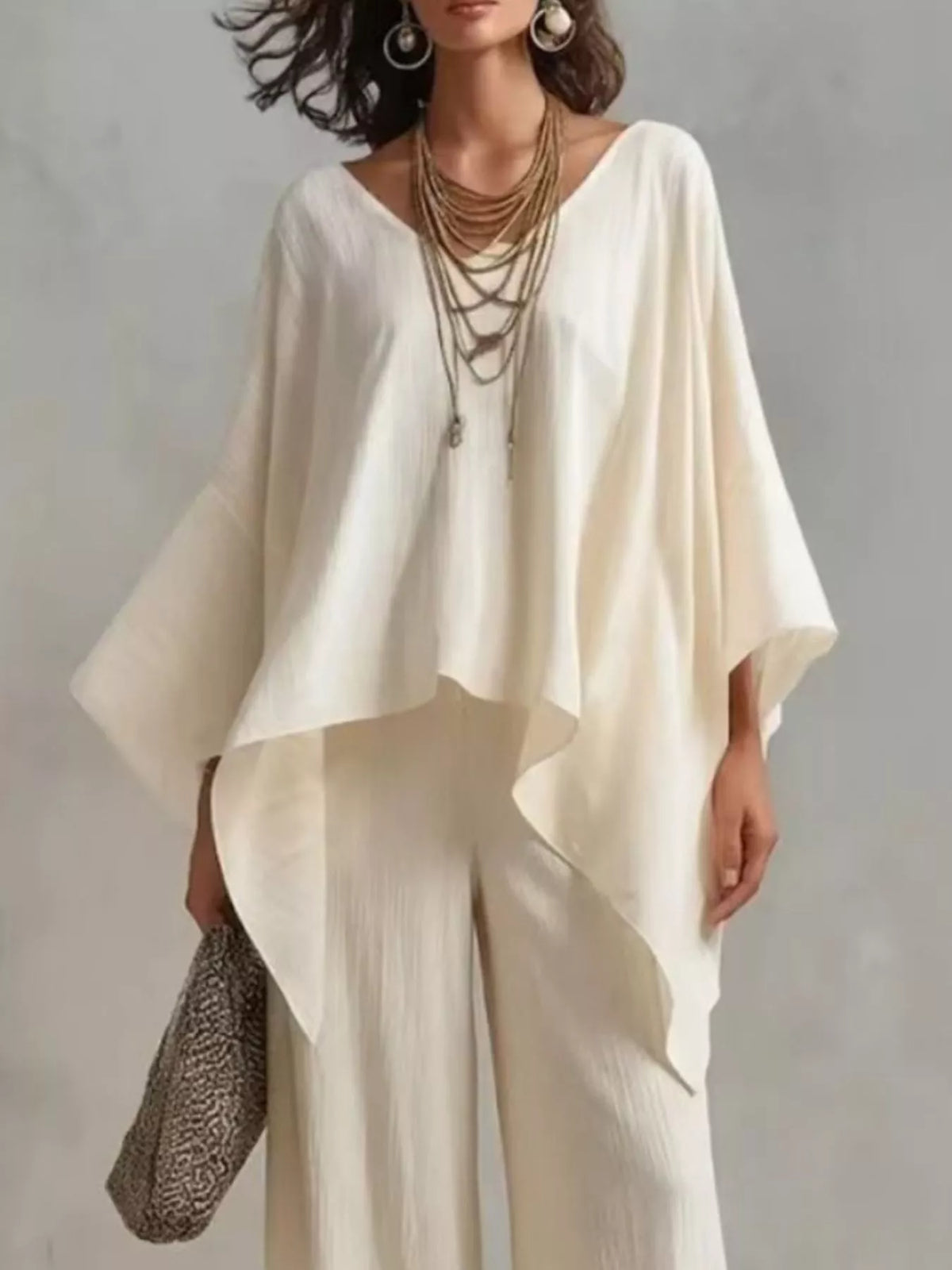 Plus size V-neck top and pants loungewear set from Plush Fashion Hub, comfortable full-size lounge outfit in soft fabric.